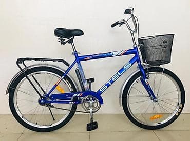 20lik velo: Bu, dağ velosipedidir, qara rəngdədir və yaşıl detalları var — 1