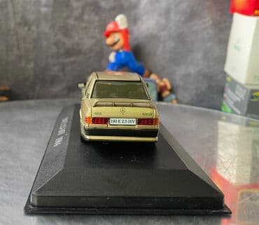 metbex tavan modelleri: Коллекционная модель Mercedes-Benz 190E 2.3 16V W201 gold 1984 EDICOLA — 4