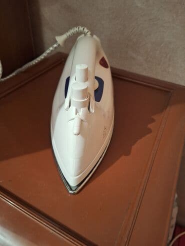 sac duzləşdirici fenlər: Buxarlı ütü — 2