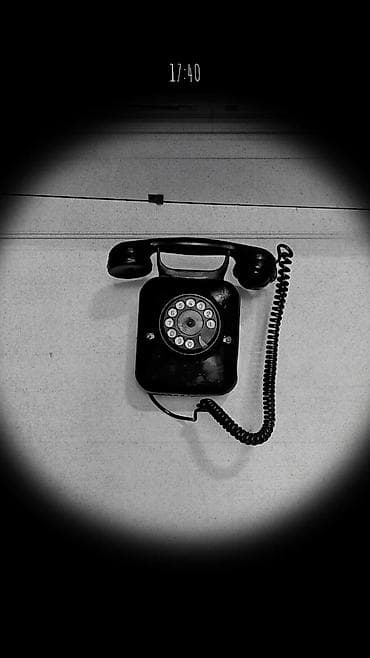 Stasionar telefon Simli