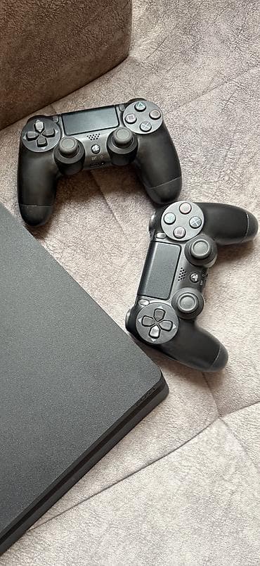 oyun diskleri: Sony PlayStation 4 Slim oyun konsolu Xüsusiyyətlər: - Model: PS4 Slim — 4