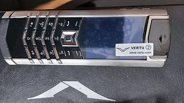 telefon hisseleri: Vertu Signature Touch, Düyməli — 4