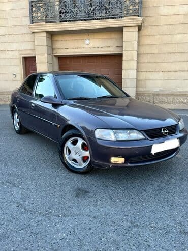 садор диски: Tünd boz rəngdə "Opel Vectra" modeli, sedan tipli avtomobil — 2