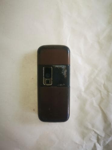 ТВ и видео: Nokia цвет - Коричневый, Кнопочный — 6