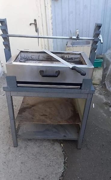 Manqal döner Altinin nerj masasi ile birlikde.Qiymet 400 azn Unvan