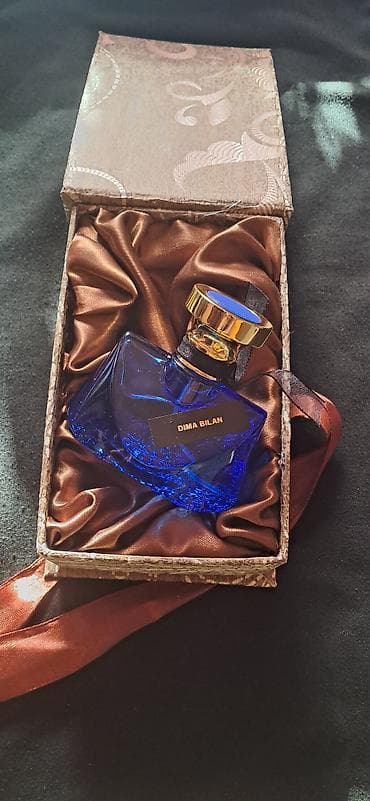 smart saat iphone: Dima Bilan parfum – mavi şüşədə, qızılı-qara detallı zərif flakon — 1