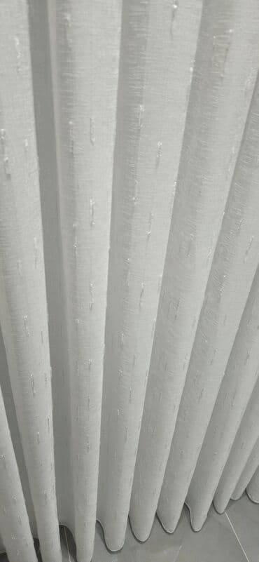 tül parçalar: Ağ rəngli, nazik, şəffaf parçadır. Üzərində həndəsi naxışlar var — 17