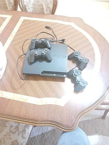 video mixer: PlayStation 3 (PS3) Slim oyun konsolu Xüsusiyyətlər: - Model: PS3 — 1