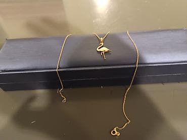 ağ qızılın qiyməti: Boyunbağı — 2