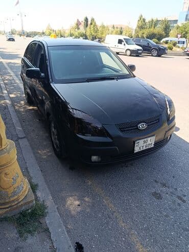 задняя фара в багажник ниссан примера р11: Kia sedan, qara rəng. Şəhər içi rahat və qənaətcil istifadə üçün — 1