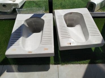 tualet ucun unitaz: Ağ rəngli, keramika materialından hazırlanmış yer tualetləri. Bu model — 1