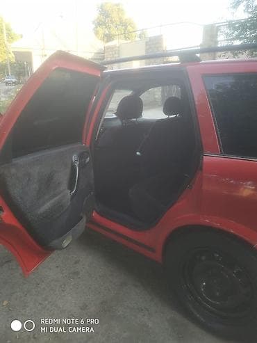 ford transit 2009: Opel Astra Vectra (ünvan nömrəsi görünür), qırmızı rəngli universal — 10