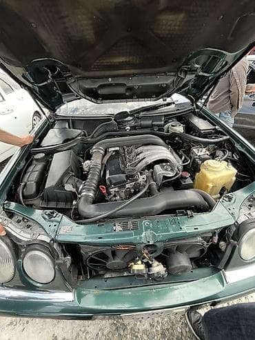 Mercedes-Benz E-Class: 2.9 l | 1997 il Sedan — 4