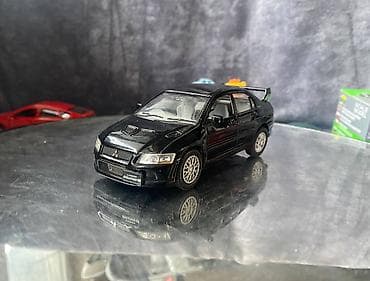 Коллекционная модель Mitsubishi Lancer Evolution VII black 2002 lalafo.az -da Коллекционная модель Mitsubishi Lancer Evolution VII black 2002