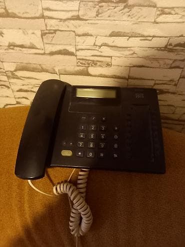 Stasionar telefon Simli