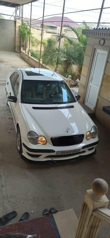 mercedes geyimleri: Mercedes-Benz C-Class: 2.3 l | 2005 il Sedan — 4