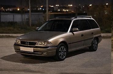 duman: Opel Astra: 1.6 l | Universal — 2