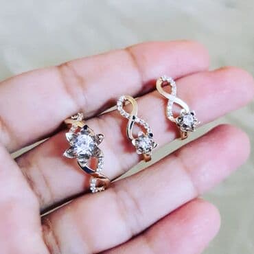 italyan qizili: Dəstə daxildir: Sırğa, Üzük, Sarı qızıl, 585 Əyar, 552 g — 2