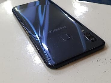 Samsung Galaxy A30, 64 ГБ, цвет - Синий, Face ID, Две SIM карты, Кнопочный