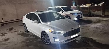 spoiler: Ford Fusion: 2 l | 74000 km Sedan — 9