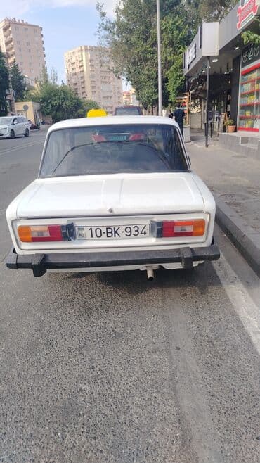 turbo az 06: VAZ 2106 sedan, ağ rəng. Klassik kuzov, 4 qapı, arxa ötürücülü. Ön və — 3
