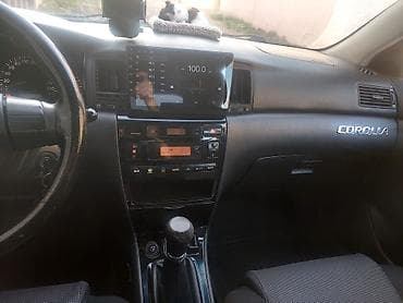 vito disk: Toyota Corolla hatchback (E12), tünd mavi rəng. - Kuzov: 5 qapılı — 8