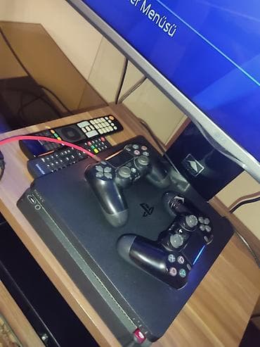 plesteyşn 5: Ps4 slim 400gb 2 dene pult şexsi hesab uzerinde verilir hdmi kablolar — 1