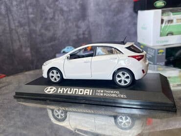 maşın modeli: Коллекционная модель Hyundai i30 5 door white 2012 Pino B&D Scale — 21