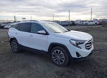 Motonəqliyyat: GMC Terrain SLT, ağ rəngli, kompakt krossover/SUV. Xüsusiyyətlər: - — 2