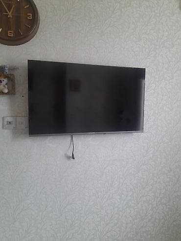 Divara quraşdırılmış düz ekran televizor 5 ayin televizorudu 102 ekran