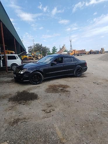 bmw e53 x5: Mercedes-Benz E-Class: 5 l | 2004 il Sedan — 8