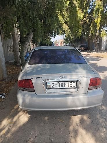 chevrolet volt salon: Hyundai Sonata sedan – gümüşü rəngdə, avtomatik transmissiya — 4