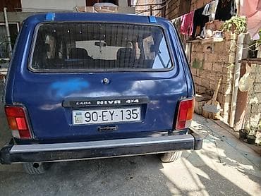 niva şit: LADA Niva 4x4, mavi rəng, 5 qapılı universal kuzov. Xüsusiyyətlər: - — 2
