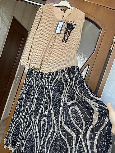 Qadın dəsti – plissəli uzun ətək 170 azn alınıb,100 azn — 2