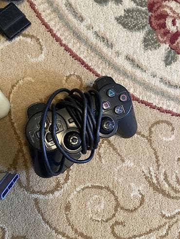 plesdeyşin 2: Sony PlayStation 2 Slim (PS2) oyun konsolu Xüsusiyyətlər: - Model — 4