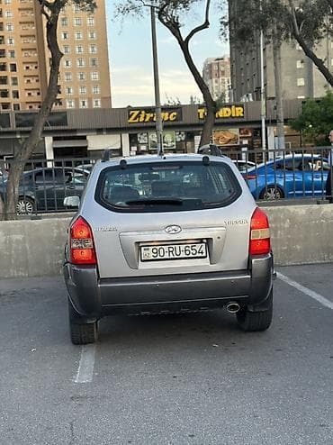 Hyundai Tucson: 2 л | 2005 г. Кроссовер — 3