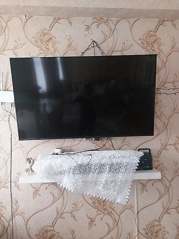 hisense tv 127 cm: Divar üçün TV asqısı – dönən və maili mexanizmli - Universal VESA — 1