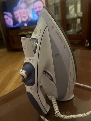 utuler: Braun Freestyle buxarlı ütü Xüsusiyyətlər: - Güc: 1750 Watt - Buxar — 2