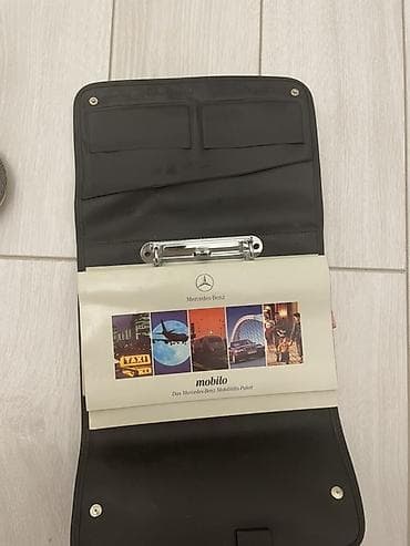 salon 06: Razılaşma yolu var Mercedes‑Benz orijinal sənəd çantası və buklet — 2