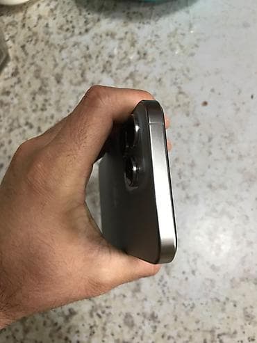 apple macbook: IPhone 15 Pro Max, 256 GB, Natural Titanium — 7