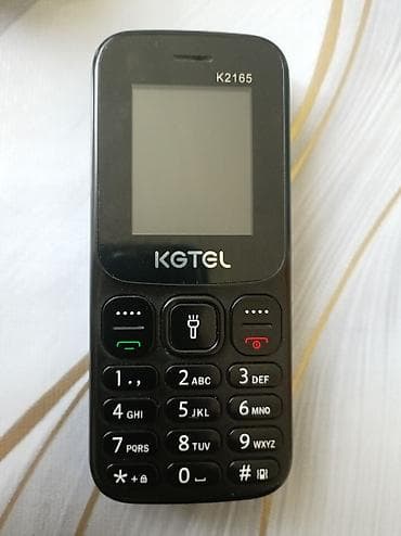 KGTEL K2165 düyməli mobil telefon Xüsusiyyətlər: - Kompakt korpus