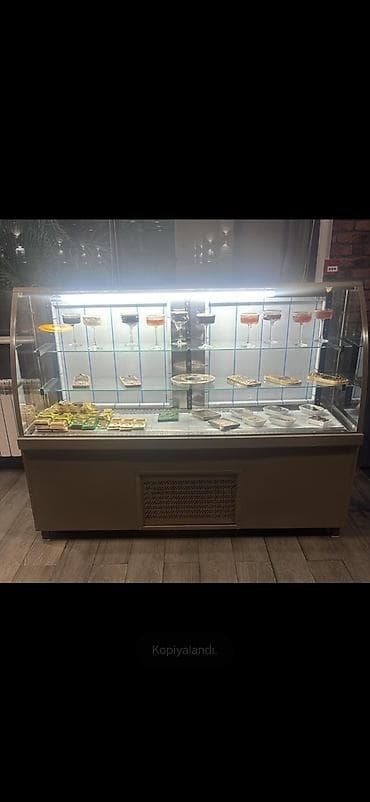 Vitrin soyuducu ela veziyyetde Tecili satilir 700 azn Unvan