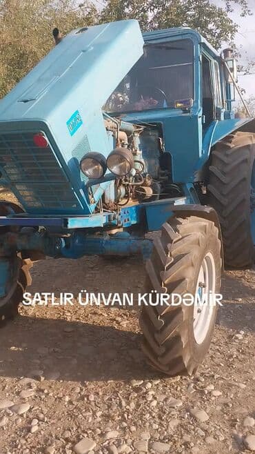 t 16 traktor: Mavi rəngli MTZ Belarus tipli təkərli traktor. Xüsusiyyətlər: - Dizel — 2