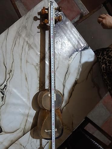 akustik gitara: Tar – Azərbaycan milli simli musiqi aləti - Korpus: iki hissəli armud — 6