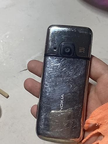 samsung mini notebook: Nokia 1, 2 GB, rəng - Gümüşü, Düyməli — 1
