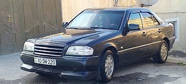 guzgu manitor: Mercedes-Benz C-Sinfi (W202) sedan tekerler 195.65.15 yaxsi vezyetdedi — 1