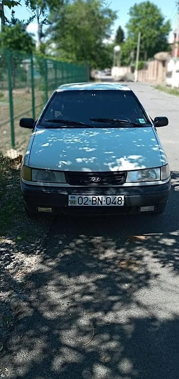 tap az niva: Hyundai Excel sedan 1997ci il - Kuzov: 4 qapılı sedan, ağ rəng - — 1