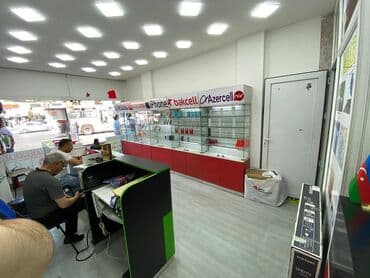 mağaza bağlanır: Telefon vitrini 5-(vitrin), aksesuar yeri, nömrə satışı, proqram və — 2