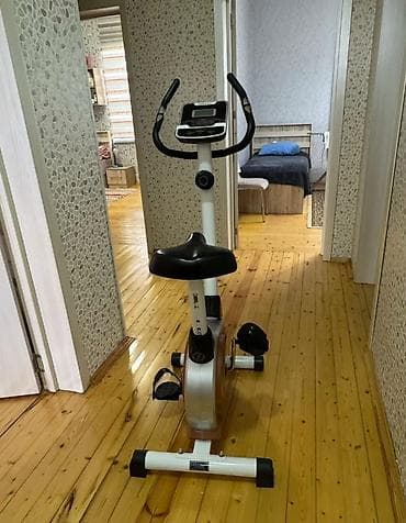 Trenajorlar: Evdə istifadə üçün nəzərdə tutulmuş velotrenajor. Bu velotrenajor — 1