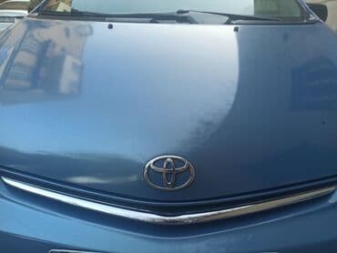 toyota prius açar: Toyota – mavi rəngli (metalik) hetçbek/sedan ön kapot görüntüsü. - — 2